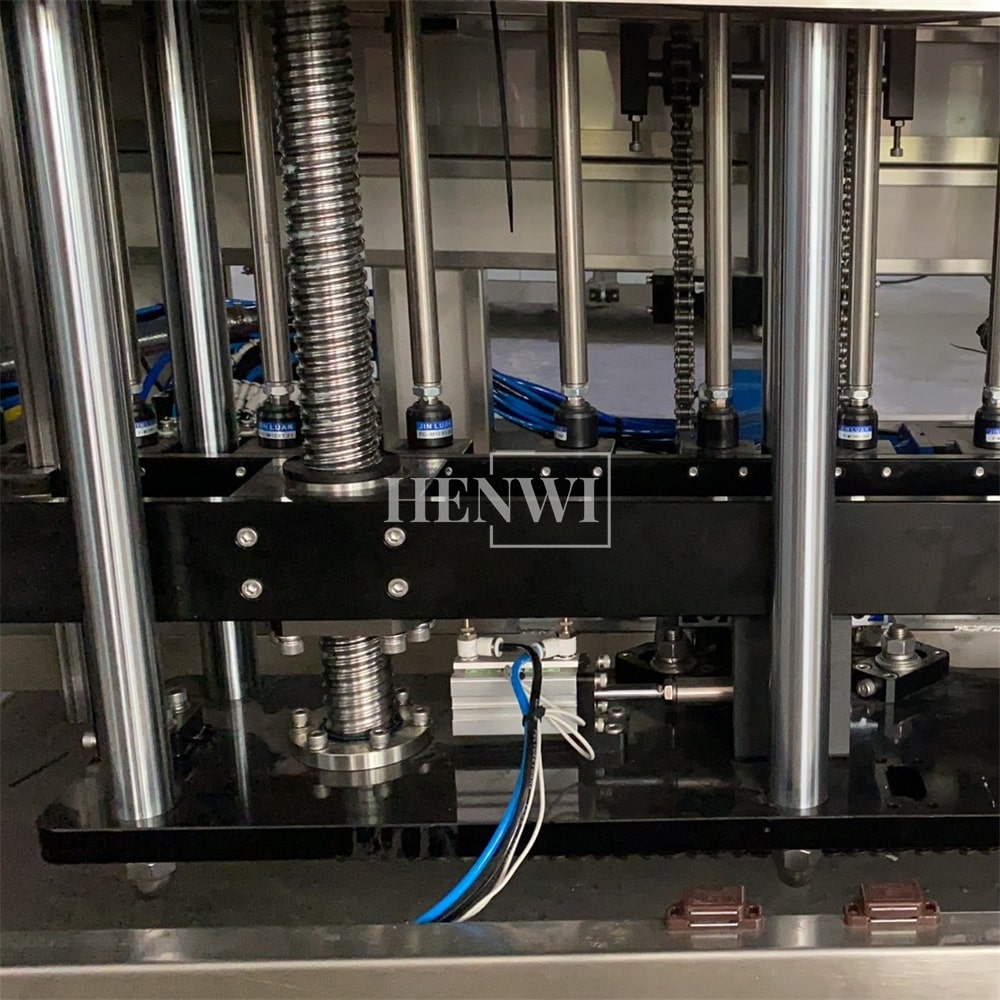 Henwi HWFM-CTF-6 Six Nozzles Automatic Constant Temperature Liquid Mixing Heating Bottling Filling Machine 6 Heads Bottle Filler With Mixer Heater