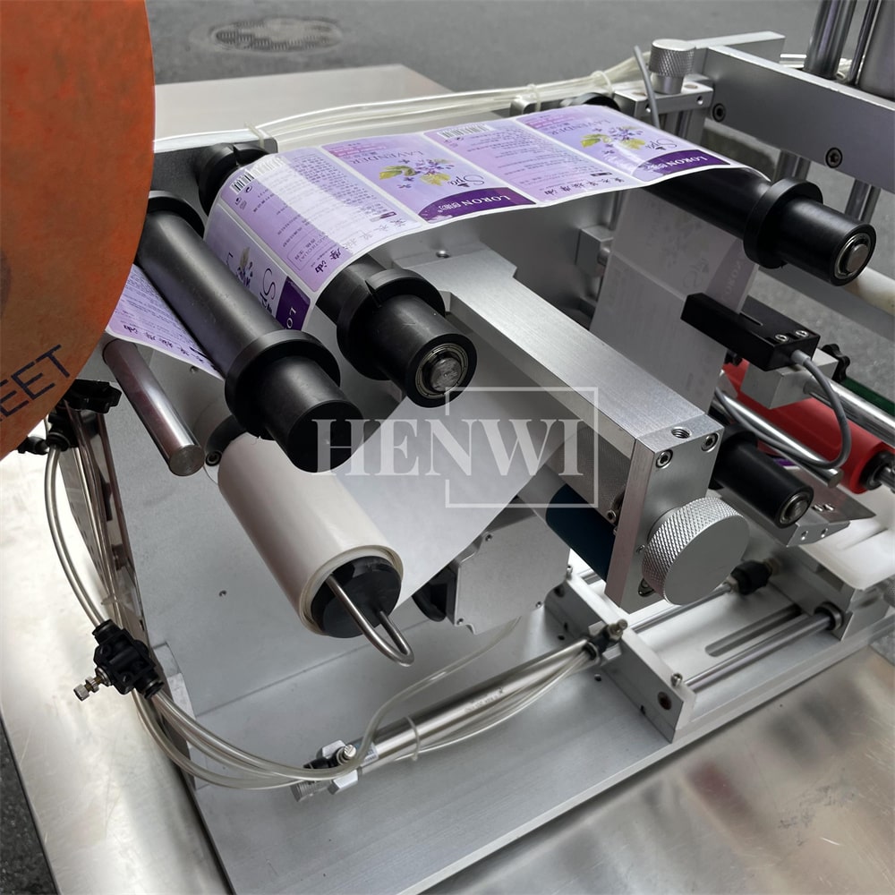 Henwi HWFCL- 1 Nozzle Semi-Auto Liquid Mixing Heating Bottling Filling Machine One Head Bottle Filler With Mixer Heater with Semi Automatic Bottle Cover Cap Capping Labeling Machine Line with Handheld Induction Sealing Device with Cooling Tunnel