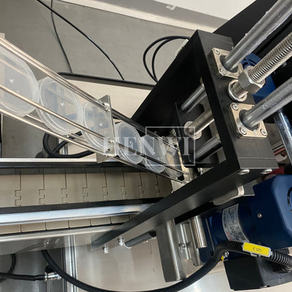 Henwi HWCM-W4x2 Automatic 2 Stations 4 Wheels Capper Bottle Screwing Capping Sealing Machine Cover Sealer with Automatic Cap Lifting Elevator Feeding Machine