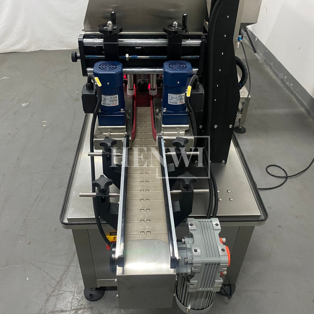 Henwi HWCM-W4x2 Automatic 2 Stations 4 Wheels Capper Bottle Screwing Capping Sealing Machine Cover Sealer with Automatic Cap Lifting Elevator Feeding Machine