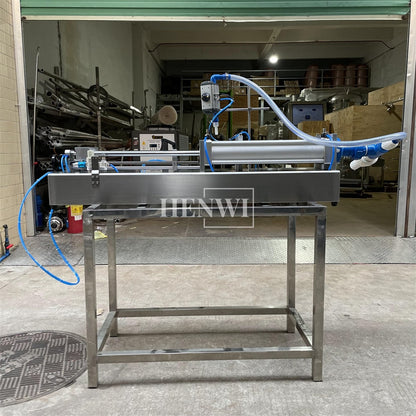 Henwi HWFF-1 Nozzles Horizontal Anti Corrosive Filler Pesticide Bleach Liquid Fertilizer Acid Liquid Alkaline Liquid Filling Machine