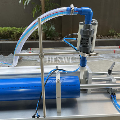 Henwi HWFF-1 Nozzles Horizontal Anti Corrosive Filler Pesticide Bleach Liquid Fertilizer Acid Liquid Alkaline Liquid Filling Machine