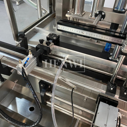 Henwi HWFM-P-8 Eight Nozzles Automatic Liquid Bottling Filling Packing Machine 8 Heads Bottle Filler