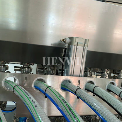 Henwi HWFM-P-8 Eight Nozzles Automatic Liquid Bottling Filling Packing Machine 8 Heads Bottle Filler
