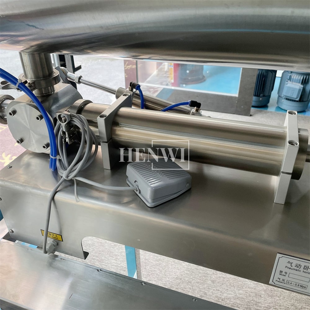 Henwi HWFM-S-HMF 1 Nozzle Semi Automatic Granular Paste Sauce Bottling Filling Machine 1 Head Bottle Horizontal Mixing Filler