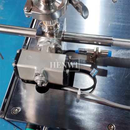 Henwi HWFM-S-HPF 1 Nozzle Semi-Auto Small Volume Liquid Bottling Filling Packing Machine 1 Head Bottle Horizontal Pressure Filler