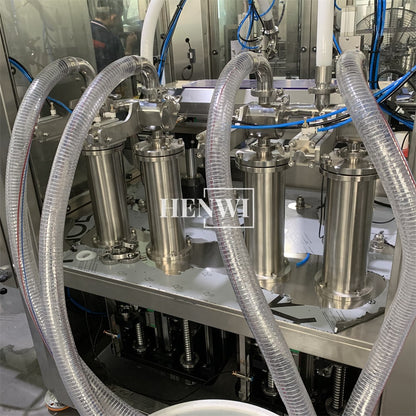 Henwi HWFM-T-2 Two Nozzles Tracking Model Automatic Liquid Bottling Filling Packing Machine 2 Heads Bottle Moving Filler