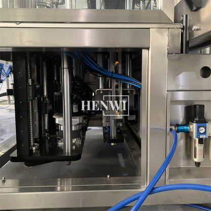 Henwi HWFM-T-2 Two Nozzles Tracking Model Automatic Liquid Bottling Filling Packing Machine 2 Heads Bottle Moving Filler