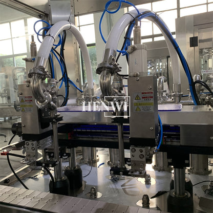 Henwi HWFM-T-2 Two Nozzles Tracking Model Automatic Liquid Bottling Filling Packing Machine 2 Heads Bottle Moving Filler