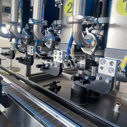 Henwi HWFM-T-4 Four Nozzles Tracking Model Automatic Liquid Bottling Filling Packing Machine 4 Heads Bottle Moving Filler