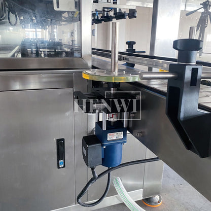 Henwi HWFM-T-4 Four Nozzles Tracking Model Automatic Liquid Bottling Filling Packing Machine 4 Heads Bottle Moving Filler