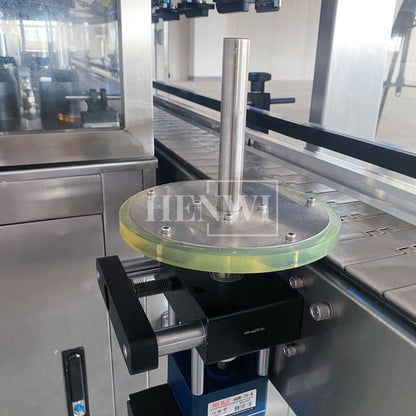 Henwi HWFM-T-4 Four Nozzles Tracking Model Automatic Liquid Bottling Filling Packing Machine 4 Heads Bottle Moving Filler