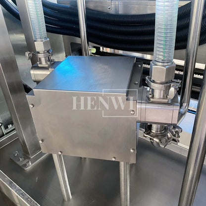 Henwi HWFM-T-4 Four Nozzles Tracking Model Automatic Liquid Bottling Filling Packing Machine 4 Heads Bottle Moving Filler