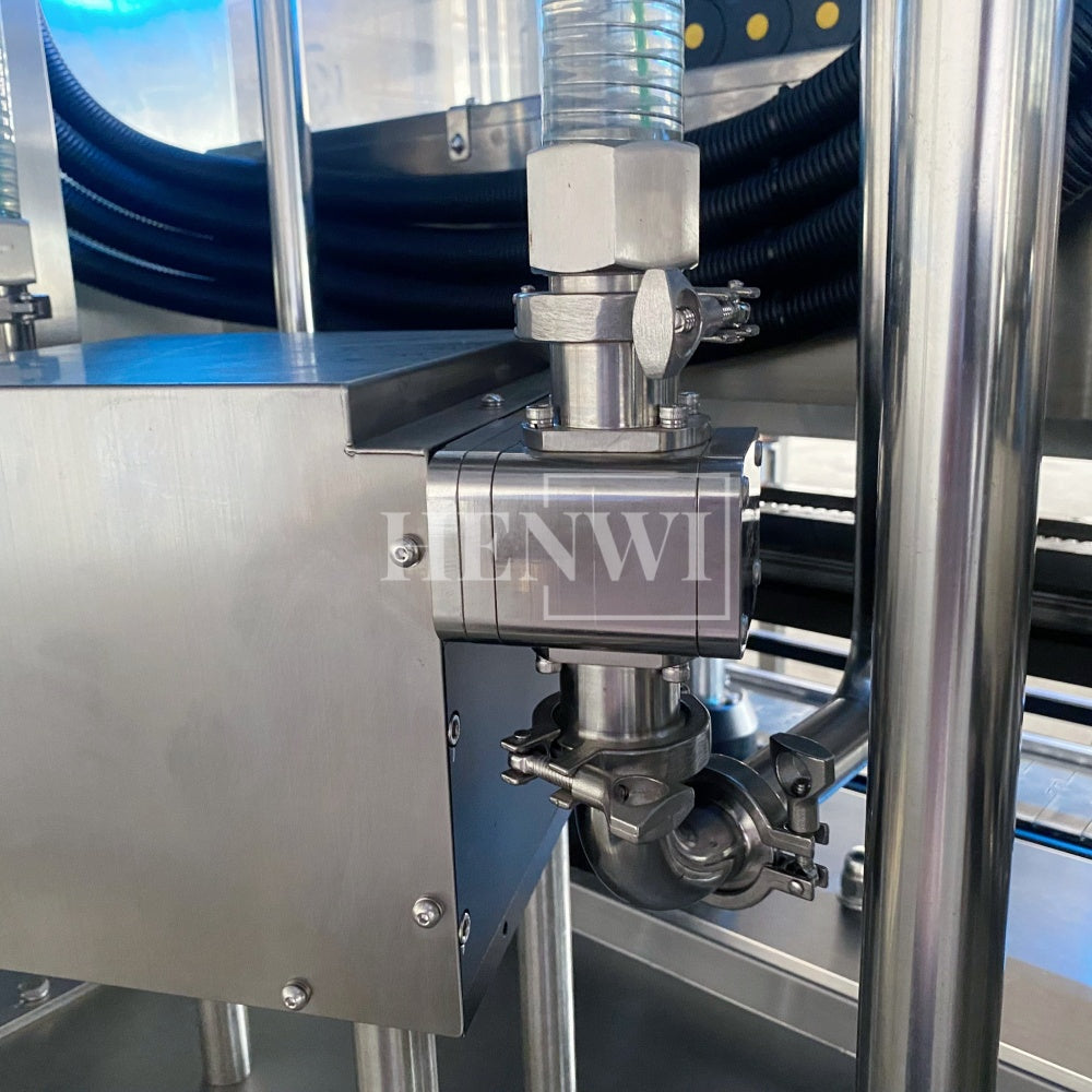 Henwi HWFM-T-4 Four Nozzles Tracking Model Automatic Liquid Bottling Filling Packing Machine 4 Heads Bottle Moving Filler