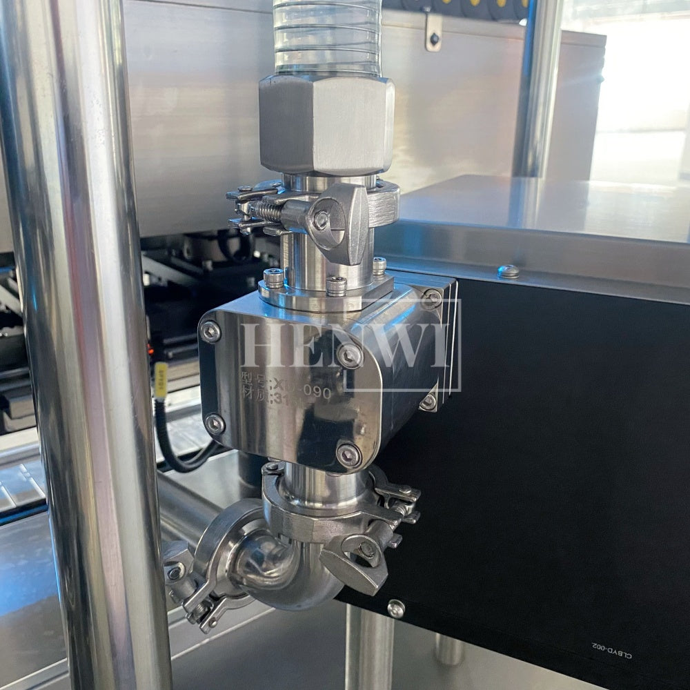 Henwi HWFM-T-4 Four Nozzles Tracking Model Automatic Liquid Bottling Filling Packing Machine 4 Heads Bottle Moving Filler