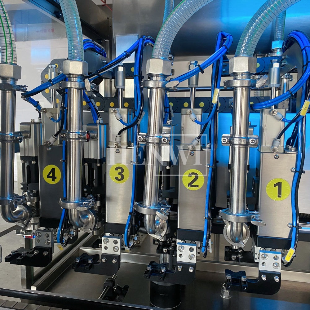 Henwi HWFM-T-4 Four Nozzles Tracking Model Automatic Liquid Bottling Filling Packing Machine 4 Heads Bottle Moving Filler