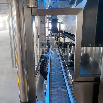 Henwi HWFM-T-4 Four Nozzles Tracking Model Automatic Liquid Bottling Filling Packing Machine 4 Heads Bottle Moving Filler