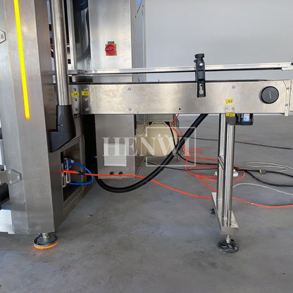 Henwi HWFM-T-4 Four Nozzles Tracking Model Automatic Liquid Bottling Filling Packing Machine 4 Heads Bottle Moving Filler