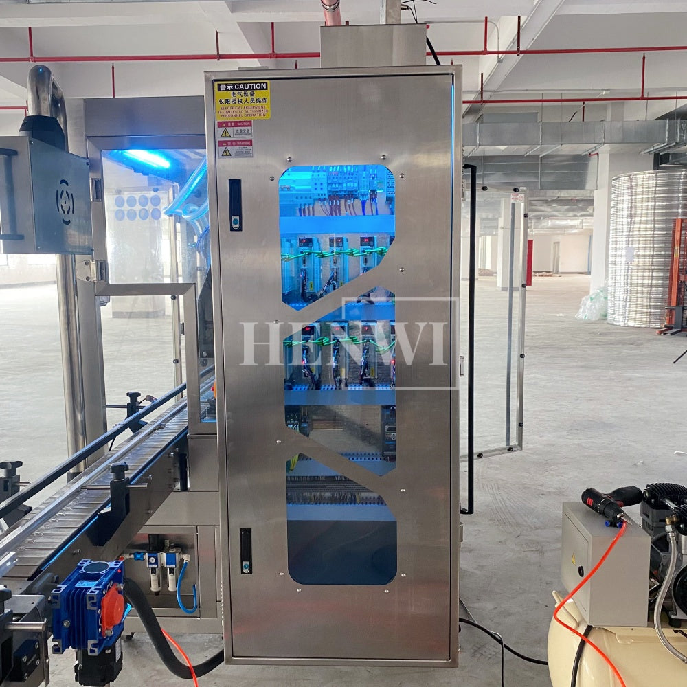 Henwi HWFM-T-4 Four Nozzles Tracking Model Automatic Liquid Bottling Filling Packing Machine 4 Heads Bottle Moving Filler