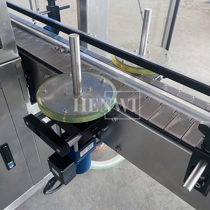 Henwi HWFM-T-4 Four Nozzles Tracking Model Automatic Liquid Bottling Filling Packing Machine 4 Heads Bottle Moving Filler