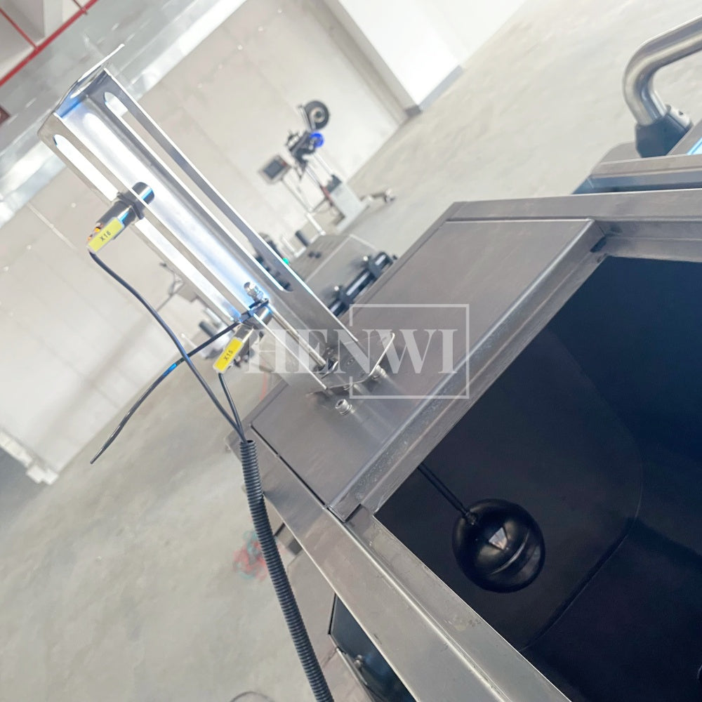Henwi HWFM-T-4 Four Nozzles Tracking Model Automatic Liquid Bottling Filling Packing Machine 4 Heads Bottle Moving Filler