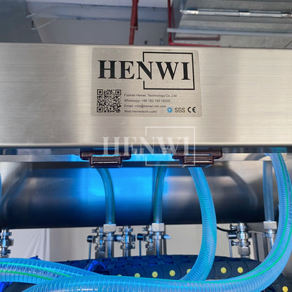 Henwi HWFM-T-4 Four Nozzles Tracking Model Automatic Liquid Bottling Filling Packing Machine 4 Heads Bottle Moving Filler