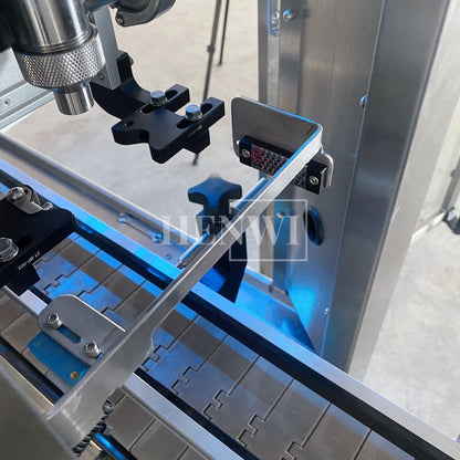 Henwi HWFM-T-4 Four Nozzles Tracking Model Automatic Liquid Bottling Filling Packing Machine 4 Heads Bottle Moving Filler