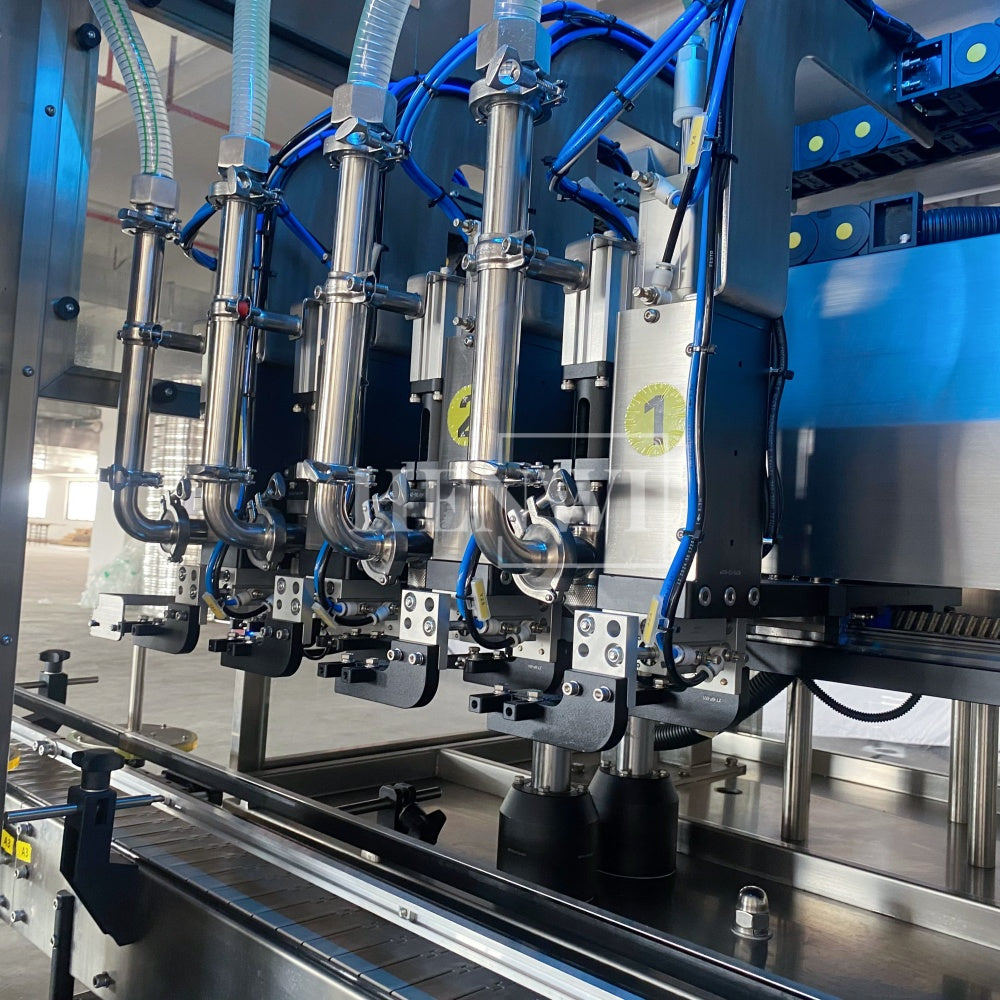 Henwi HWFM-T-4 Four Nozzles Tracking Model Automatic Liquid Bottling Filling Packing Machine 4 Heads Bottle Moving Filler