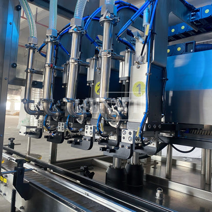 Henwi HWFM-T-4 Four Nozzles Tracking Model Automatic Liquid Bottling Filling Packing Machine 4 Heads Bottle Moving Filler