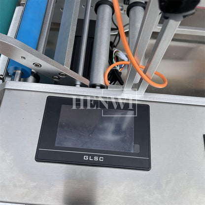 Henwi HWLM-S-HR Semi Auto Horizontal Model Round Bottle Jar Labeller Machine Self-Adhesive Sticker Labeling Machine