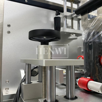 Henwi HWLM-Bottle Sleeve Dropping Wrapping Shrinking Machine Plastic Glass Beer Bottle Jar Pop Can Tin Sleeve Labeling Steam Shrinking Machine