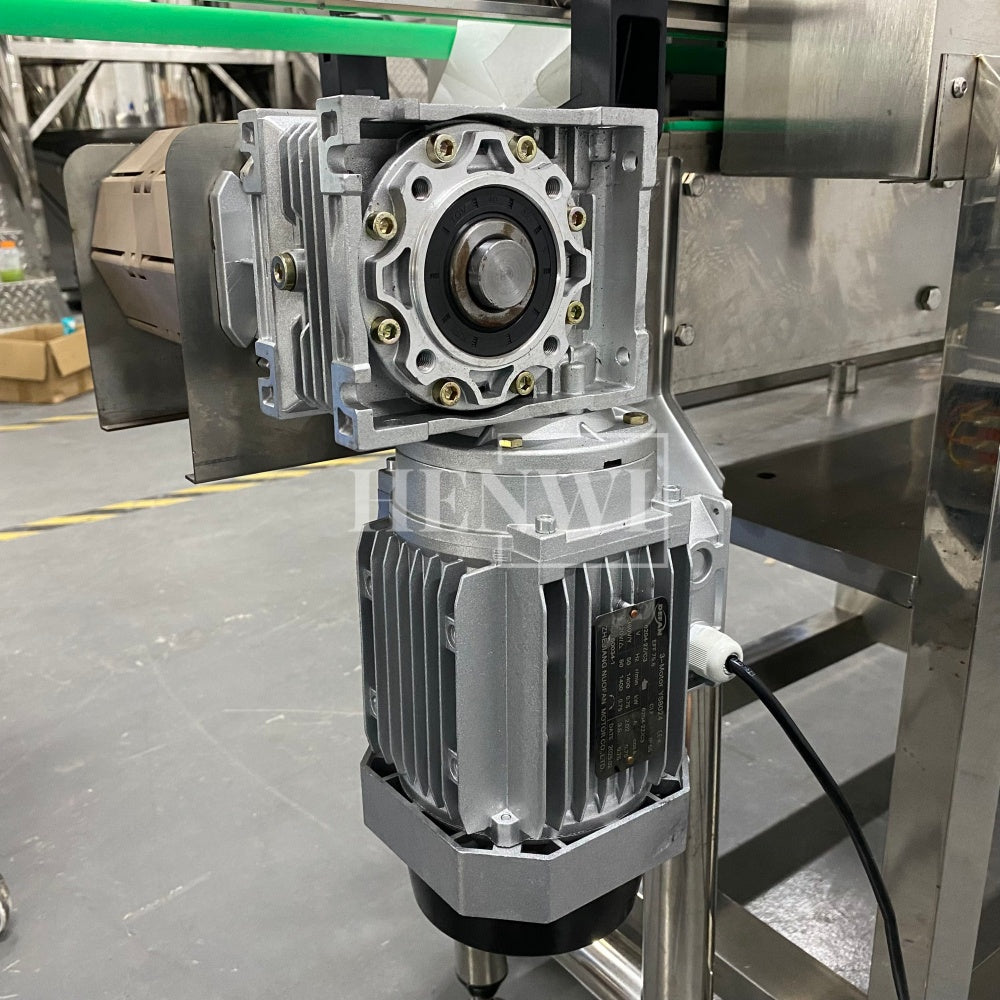 Henwi HWLM-Bottle Sleeve Dropping Wrapping Shrinking Machine Plastic Glass Beer Bottle Jar Pop Can Tin Sleeve Labeling Steam Shrinking Machine