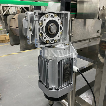 Henwi HWLM-Bottle Sleeve Dropping Wrapping Shrinking Machine Plastic Glass Beer Bottle Jar Pop Can Tin Sleeve Labeling Steam Shrinking Machine