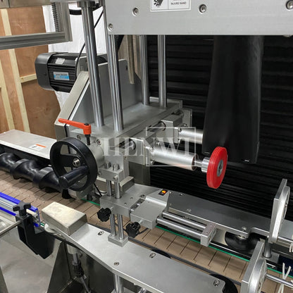 Henwi HWLM-Bottle Sleeve Dropping Wrapping Shrinking Machine Plastic Glass Beer Bottle Jar Pop Can Tin Sleeve Labeling Steam Shrinking Machine