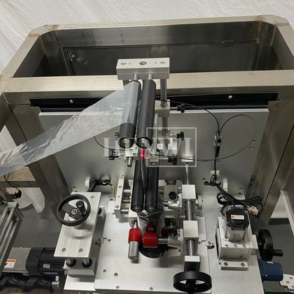 Henwi HWLM-Bottle Sleeve Dropping Wrapping Shrinking Machine Plastic Glass Beer Bottle Jar Pop Can Tin Sleeve Labeling Steam Shrinking Machine