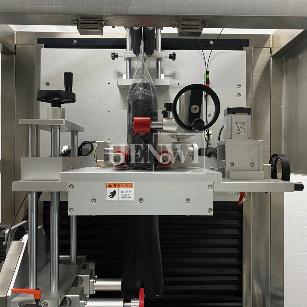 Henwi HWLM-Bottle Sleeve Dropping Wrapping Shrinking Machine Plastic Glass Beer Bottle Jar Pop Can Tin Sleeve Labeling Steam Shrinking Machine