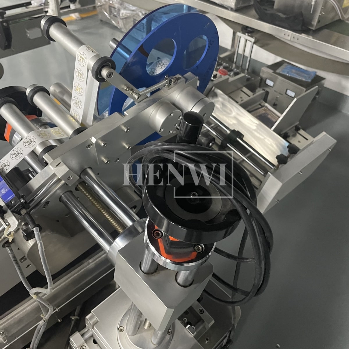 Henwi HWLM-TF Automatic Bottle Jar Top Flat / Box Case Flank Side Labeller Machine Self-Adhesive Sticker Labeling Machine