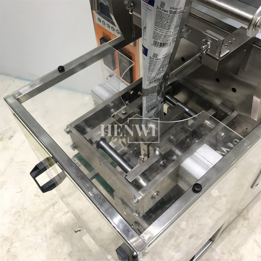 Henwi HWSM-Single Lane Liquid Sachet Filler Sealer Water Juice Honey Sauce Shampoo Cream Syrup Filling Packing Machine