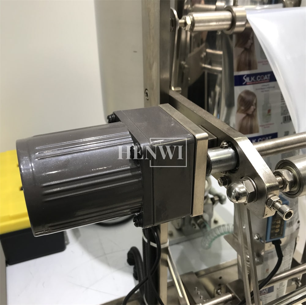 Henwi HWSM-Single Lane Liquid Sachet Filler Sealer Water Juice Honey Sauce Shampoo Cream Syrup Filling Packing Machine