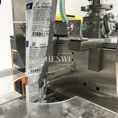 Henwi HWSM-Single Lane Liquid Sachet Filler Sealer Water Juice Honey Sauce Shampoo Cream Syrup Filling Packing Machine