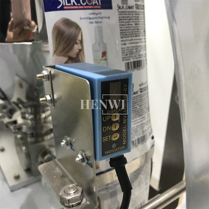 Henwi HWSM-Single Lane Liquid Sachet Filler Sealer Water Juice Honey Sauce Shampoo Cream Syrup Filling Packing Machine