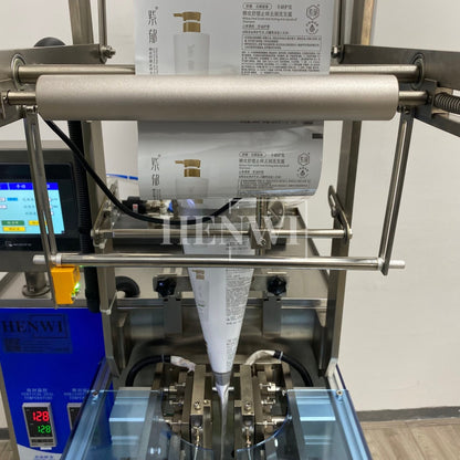 Henwi HWSM-1 Lane Liquid Sachet Filler Sealer Water Juice Honey Sauce Shampoo Cream Syrup Filling Packing Machine