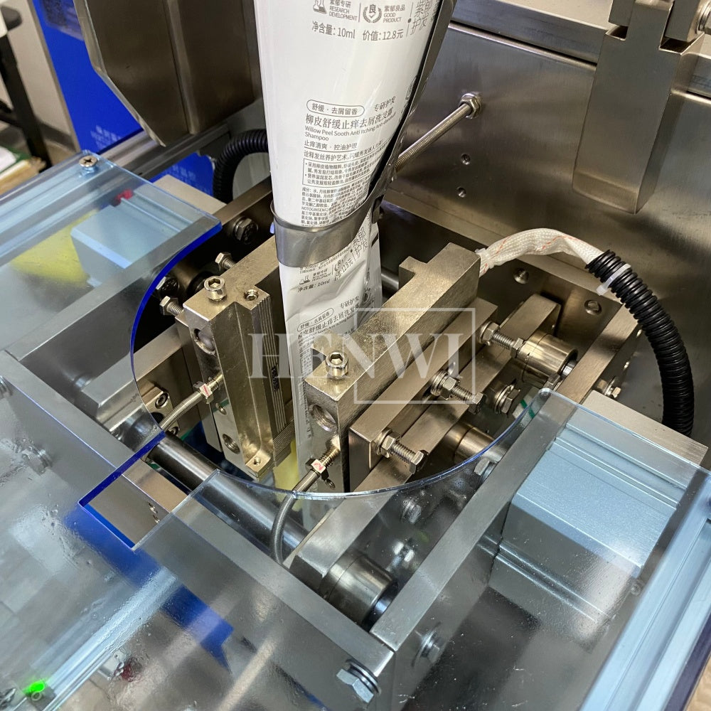 Henwi HWSM-1 Lane Liquid Sachet Filler Sealer Water Juice Honey Sauce Shampoo Cream Syrup Filling Packing Machine