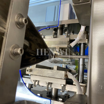 Henwi HWSM-1 Lane Liquid Sachet Filler Sealer Water Juice Honey Sauce Shampoo Cream Syrup Filling Packing Machine