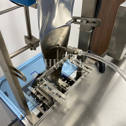 Henwi HWSM-1 Lane Liquid Sachet Filler Sealer Water Juice Honey Sauce Shampoo Cream Syrup Filling Packing Machine