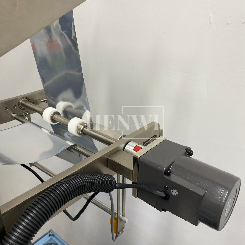 Henwi HWSM-1 Lane Liquid Sachet Filler Sealer Water Juice Honey Sauce Shampoo Cream Syrup Filling Packing Machine