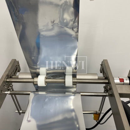 Henwi HWSM-1 Lane Liquid Sachet Filler Sealer Water Juice Honey Sauce Shampoo Cream Syrup Filling Packing Machine