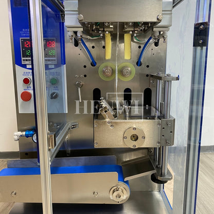 Henwi HWSM-1 Lane Liquid Sachet Filler Sealer Water Juice Honey Sauce Shampoo Cream Syrup Filling Packing Machine