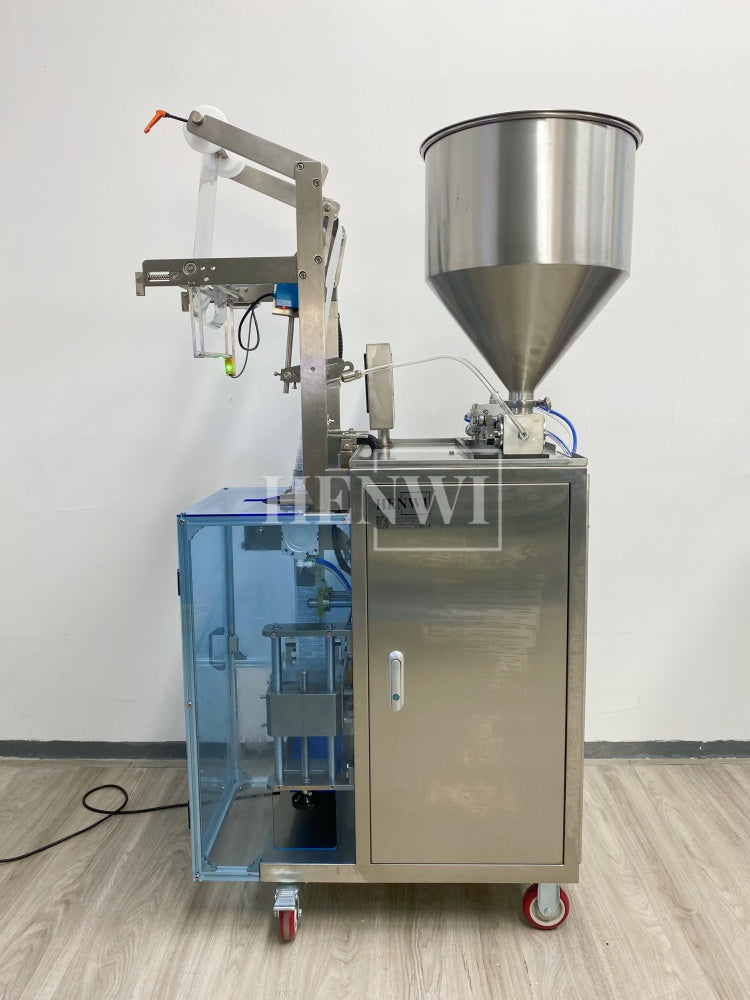 Henwi HWSM-1 Lane Liquid Sachet Filler Sealer Water Juice Honey Sauce Shampoo Cream Syrup Filling Packing Machine