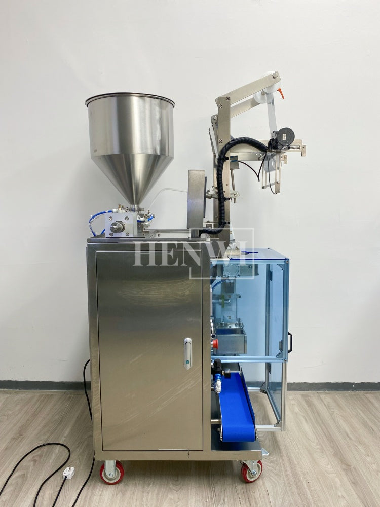 Henwi HWSM-1 Lane Liquid Sachet Filler Sealer Water Juice Honey Sauce Shampoo Cream Syrup Filling Packing Machine